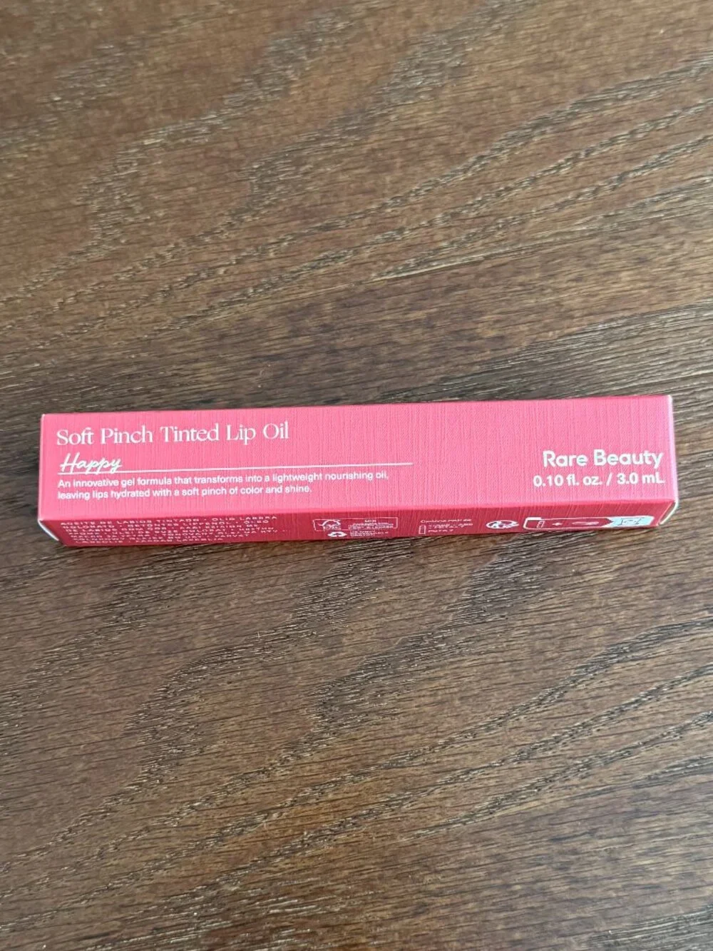 Soft Pinch Tinted Lip Oil in Happy (cool pink)